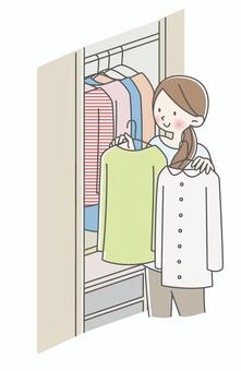クローゼットの前で服装をチェックしている男性のイラスト